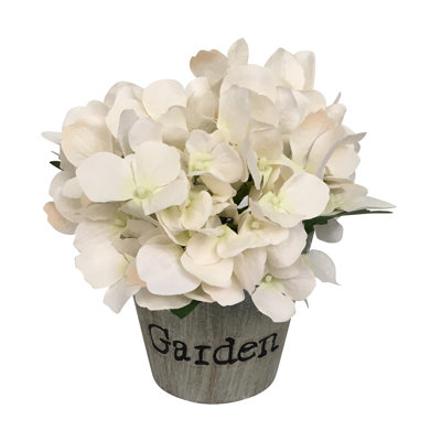 Arrangement floral dans un pot gris