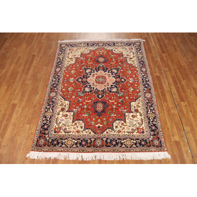 Tapis orange médaillon traditionnel en laine 5 x 7