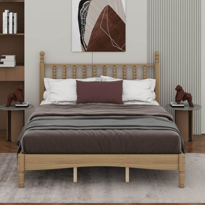 Grand lit plateforme en bois avec tête de lit en forme de gourde