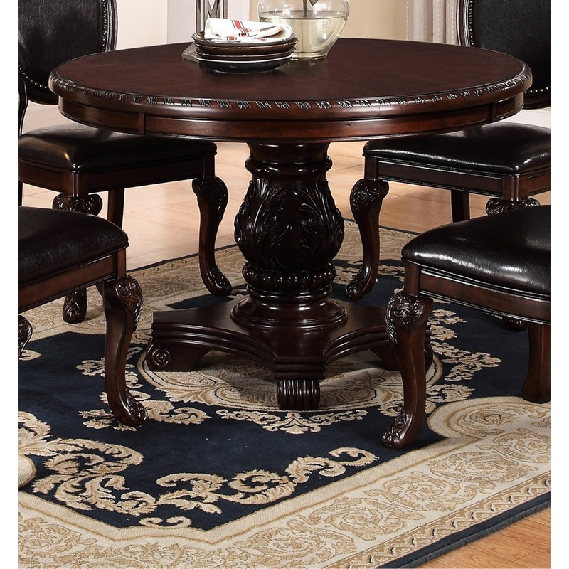 Élégante table de salle à manger à piédestal brun foncé - Donnez à votre pièce un éclat traditionnel et une base majestueuse