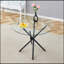 Table circulaire en verre trempé transparent avec pieds entrelacés en métal noir pour un décor moderne et minimaliste-1597896840