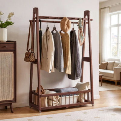 Portant à vêtements autoportant en bois massif noyer 23,62 "avec panier de rangement