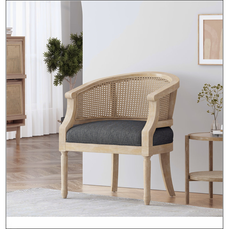 Chaise d'appoint avec structure en bois d'hévéa et revêtement gris anthracite, combinant élégance rétro et confort pour n'importe quelle pièce