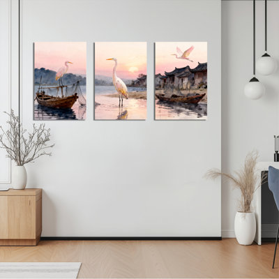 Ensemble de 3 tableaux sur toile tendue représentant une aigrette et un bateau de pêche au coucher du soleil (aquarelle).