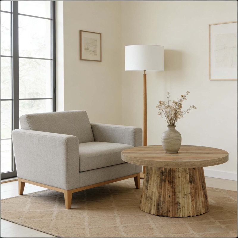 Table basse ronde à cannelures avec base cylindrique