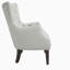 Fauteuil à oreilles capitonné