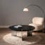 Table basse en chêne noir et panneau de fibres à densité moyenne pour les salons modernes avec plateau rond d'aspect bois et structure en acier