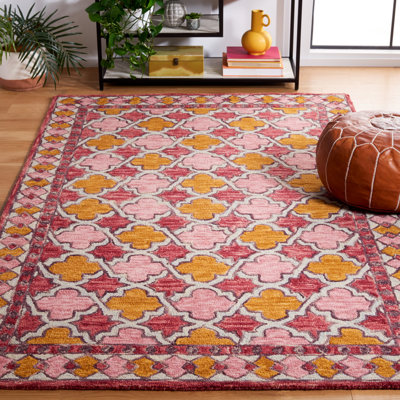 Butlin Hand Tufted Wool/Cotton Southwestern Rug in Yellow/Pink