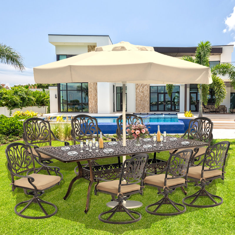 Atreyu 8 - Person Patio Dining Set with Rectangular Table , Cushions Included, Brown