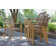 Fleur 4 - Person Wood Patio Dining Set with Round Table