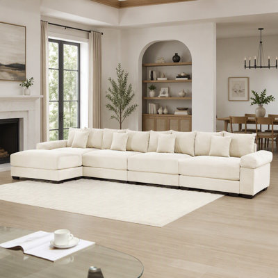 Canapé d'angle modulaire Cloud surdimensionné de 432 cm (170 pouces), en velours côtelé doux, avec pouf, assise profonde, larges accoudoirs, design ergonomique, 12 coussins décoratifs, montage facile, idéal pour le salon ou le bureau, couleur crème.