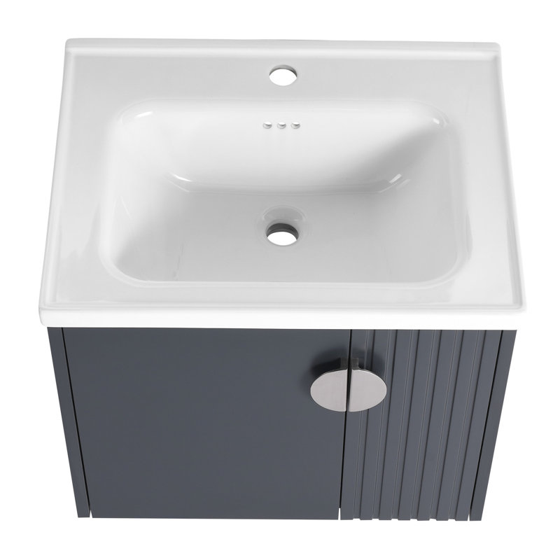 Meuble-lavabo mural de 24 po avec lavabo, pour salles de bain compactes, portes à fermeture en douceur élégantes et poignées en métal, espaces étroits en céramique, porte