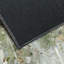 Tapis rectangulaire Divyan avec envers antidérapant