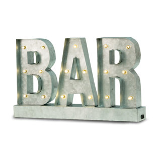 metal bar sign with lights