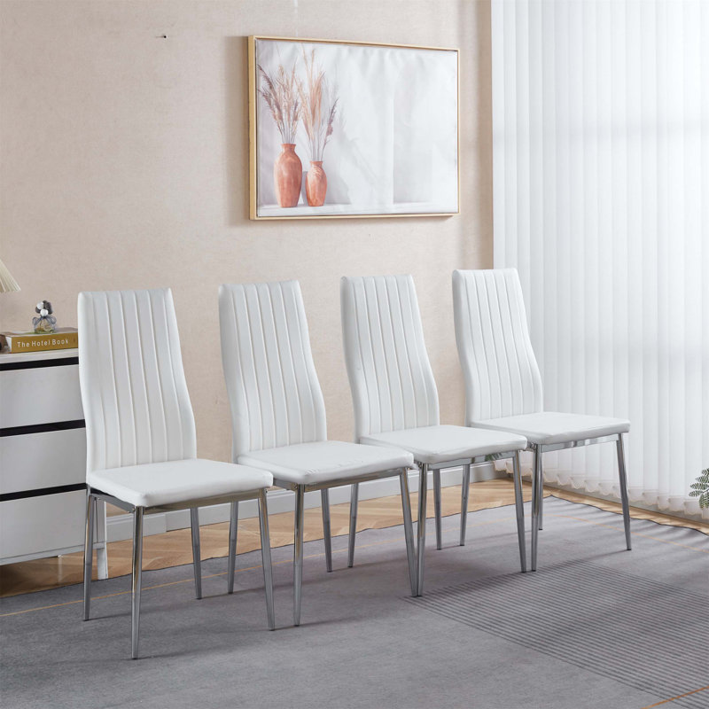 Comfortable and Durable Set of Four Chairs Ideal for Dining, Offering a Great Seating Solution for Family Gatherings and Entertaining Guests.
