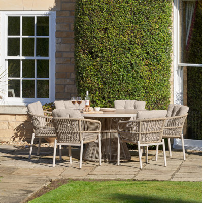 Aris 6 - Person Patio Dining Set with Round Table