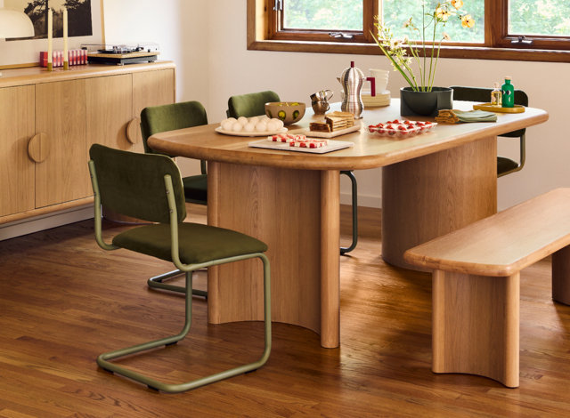 Living room with brown chairs, white couch for SRBs section