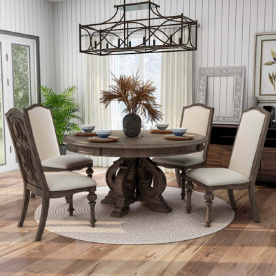 Mohall Pedestal Dining Set