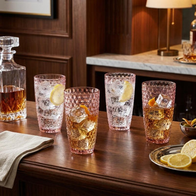 Ensemble de quatre verres à whisky sans pied en acrylique rose