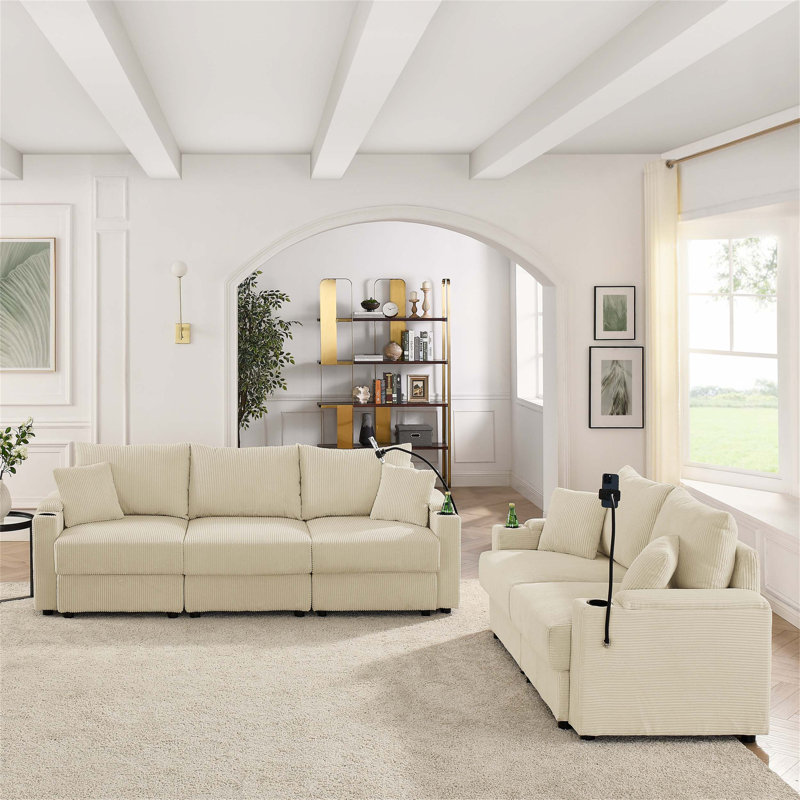 Ensemble de canapé confortable et fonctionnel avec compartiments de rangement et porte-gobelets, parfait pour une expérience de salon relaxante