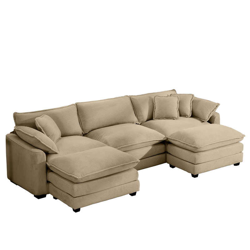 Lit en velours côtelé brun clair, offrant une solution de couchage pratique surdimensionnée, parfait pour se détendre en club