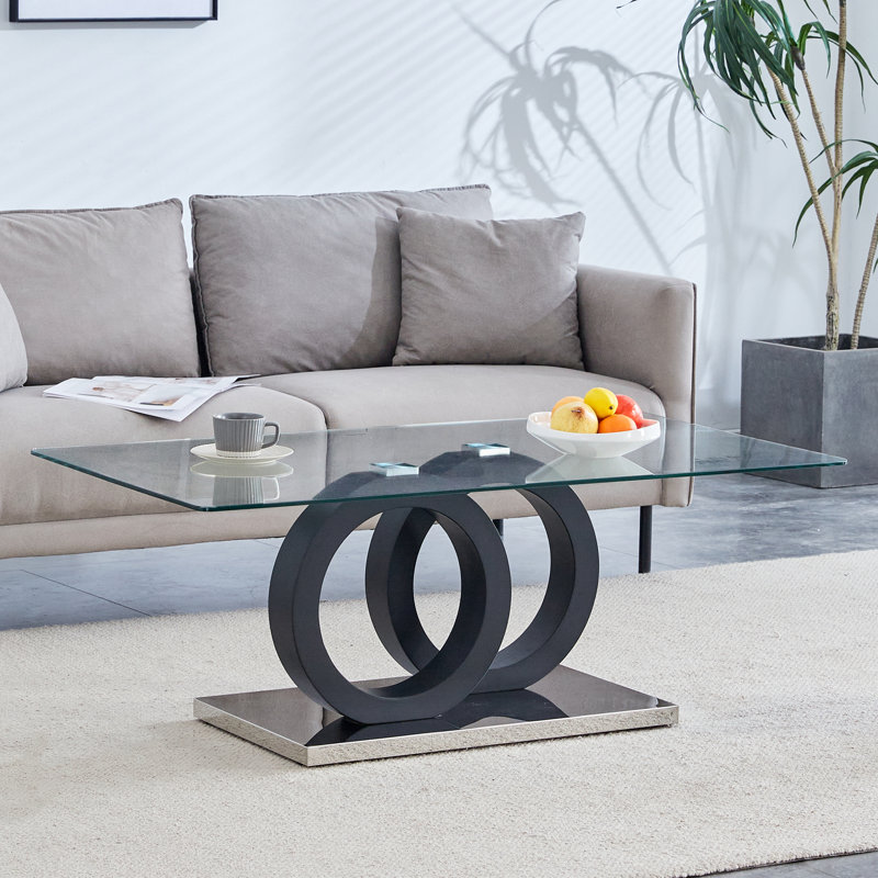 Table basse de style moderne avec plateau en panneau de fibres à densité moyenne et base noire