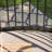 Birmadevi 4 - Person Steel Patio Dining Set Square Table with Cushions Included