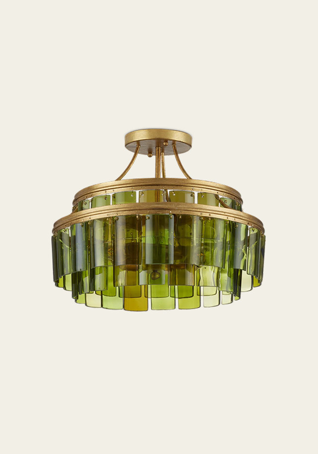 Semi-flush mount ceiling light with gold frame and green recycled glass.