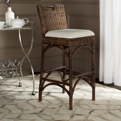 Tabouret de bar rembourré Evins avec structure en bois massif