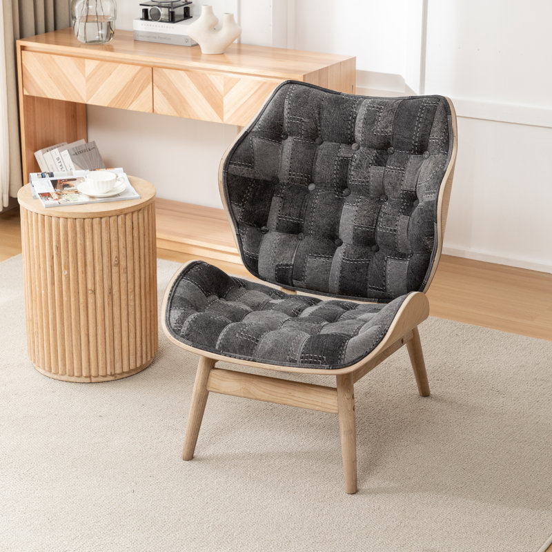 Fauteuil à oreilles capitonné Jeyshan, Polyester noir / gris
