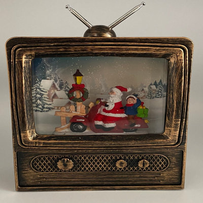 Mini télé Père Noël à l'intérieur de l'eau et de la neige
