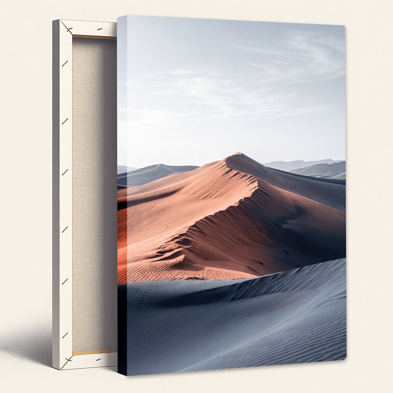 Tableau sur toile représentant un paysage désertique de dunes de sable orange et bleues, H 18 po x l 12 po