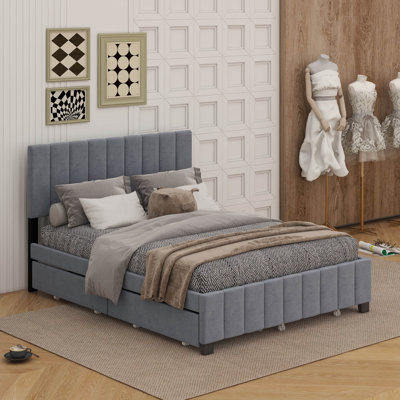 Grand size velvet upholstered platform bed with drawers and trundle