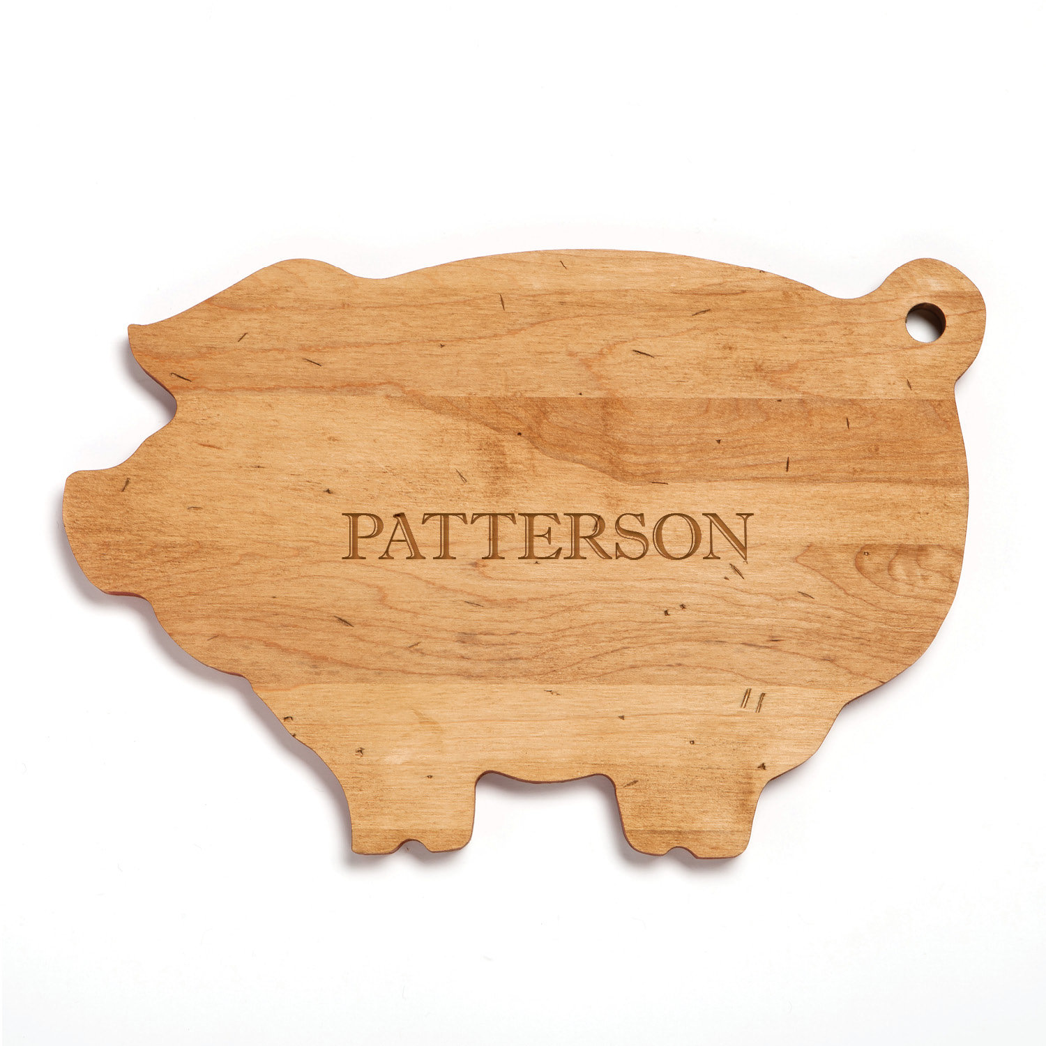 https://assets.wfcdn.com/im/91073655/compr-r85/2119/211913354/cps-maple-wood-family-name-wood-pig-cutting-board-with-custom-name-laser-engraved-cutting-board.jpg