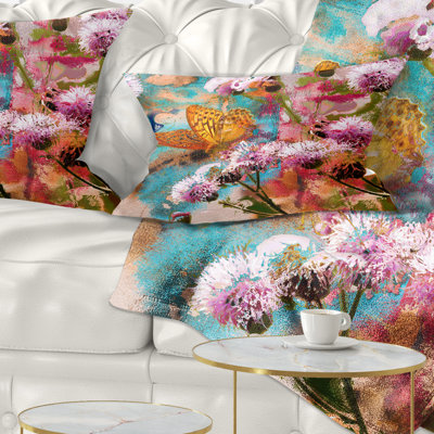 Coussin lombaire floral sur les fleurs thistle