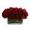 Rose Arrangement In Glass Vase