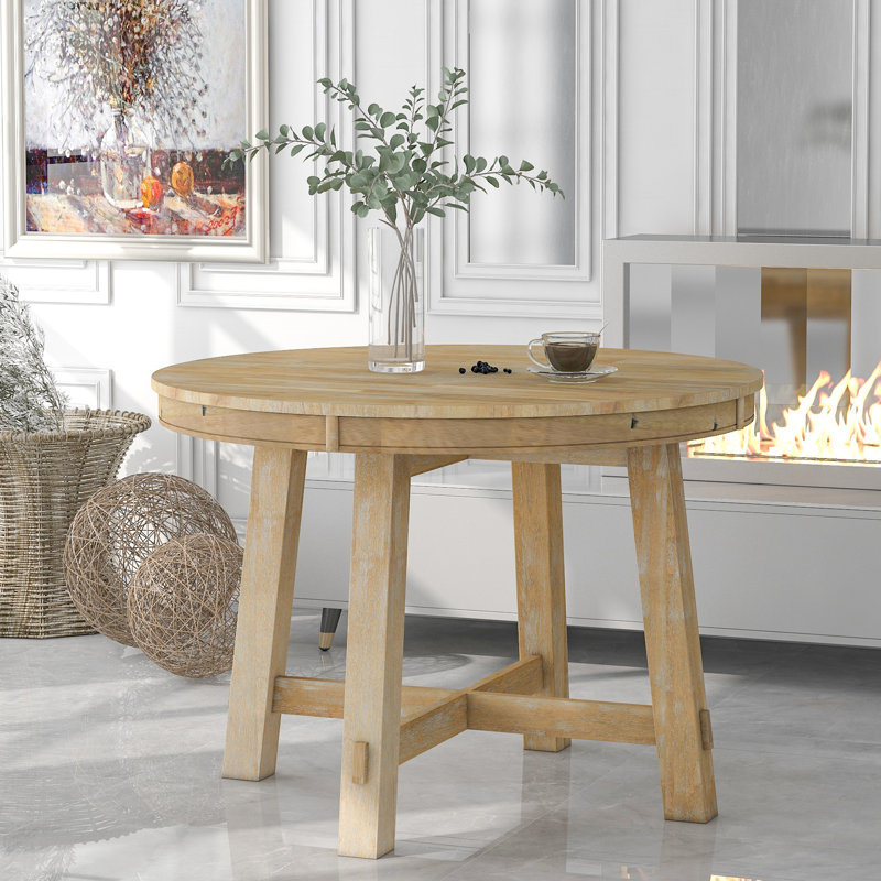 Table de style rustique aux bords arrondis - Table de salle à manger ronde en bois naturel texturé, extensible avec une rallonge de 40 cm, robuste pour 6 personnes