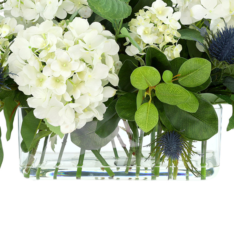 Hydrangea and Thistle Floral Arrangement in a Rectangular Glass Vase