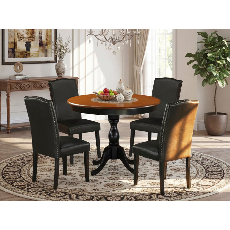 L'ensemble de 5 tables rondes comprend une table de cuisine en bois et 4 chaises rembourrées en similicuir de polyuréthane noir avec dossier haut - Finition noire