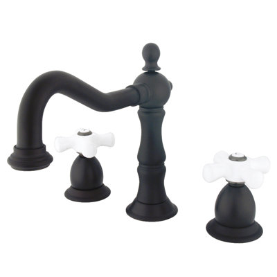 Kingston Brass Heritage Two-Handle 3-Hole Deck Mount Widespread Bathroom Faucet with Brass Pop-Up Drain