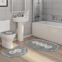 https://assets.wfcdn.com/im/91118712/resize-h210-w210%5Ecompr-r85/1819/181909502/Semi-circle+Bath+Rug+Set+with+Non-Slip+Backing.jpg