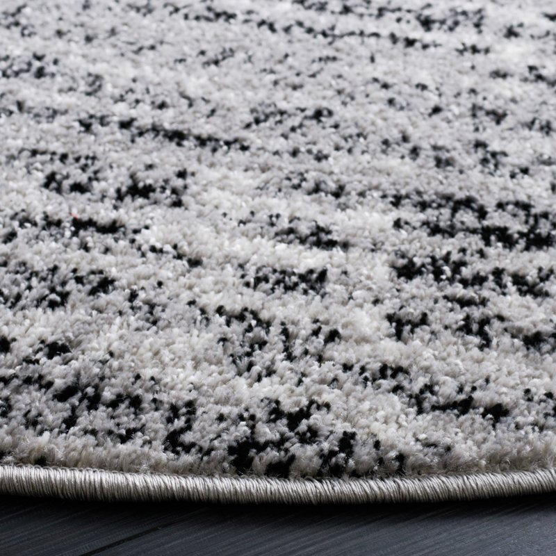 Riebe Abstract Black/Silver Area Rug, Rectangle 6' x 9'