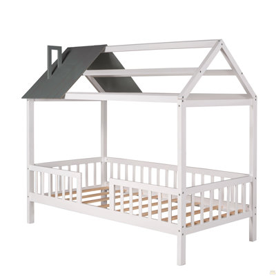 Lit simple en bois avec clôture