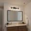 Luminaire de meuble-lavabo traditionnel avec abat-jour en verre transparent