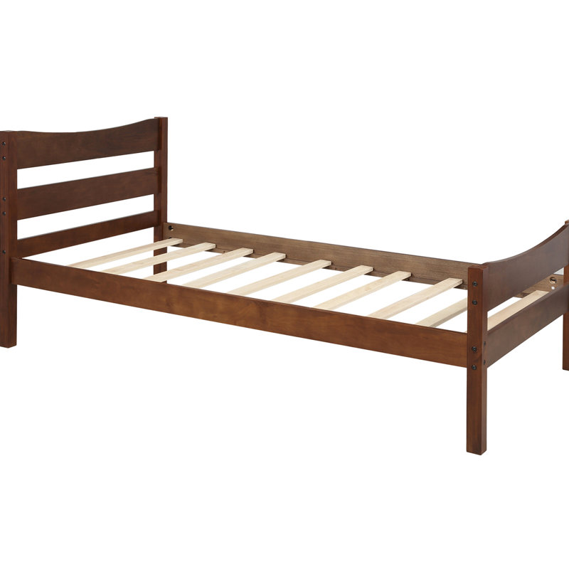 Lit plateforme simple avec tête de lit en noyer, base en lattes de bois massif noyer et système de soutien