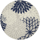 Tapis intérieur / extérieur rond en polypropylène bleu / gris 7 pi 10 po x 7 pi 10 po Isalia