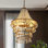 Lustre empire unique et remarquable à 4 lumières avec accents perlés Advith