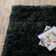 Albritton Handmade Tufted Charcoal Area Rug
