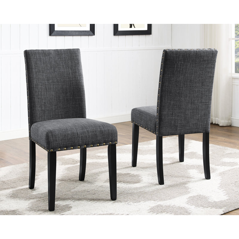 Ensemble de 2 chaises de salle à manger en tissu gris - Structure robuste en bois massif, hauteur du siège 49 cm, profondeur 65 cm, avec garniture cloutée, revêtement résistant en lin et coton.