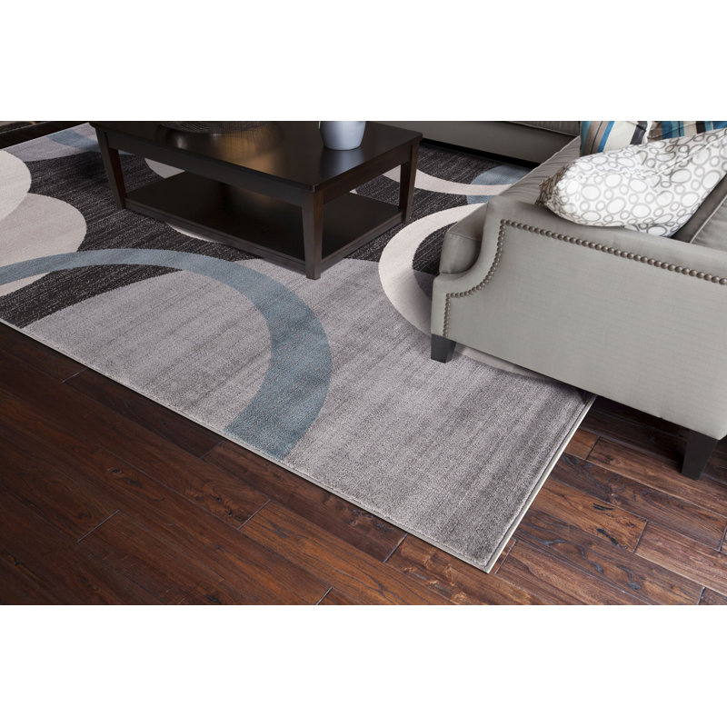 Oriental Machine Woven Circle Design Area Rug in Blue Black, Rectangle 5' x 7'